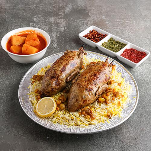 Two Pigeons with a Mixture of Egyptian Rice and Machboos Rice