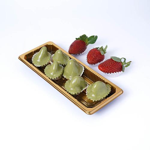 Box of Chocolate Covered in Pistachio